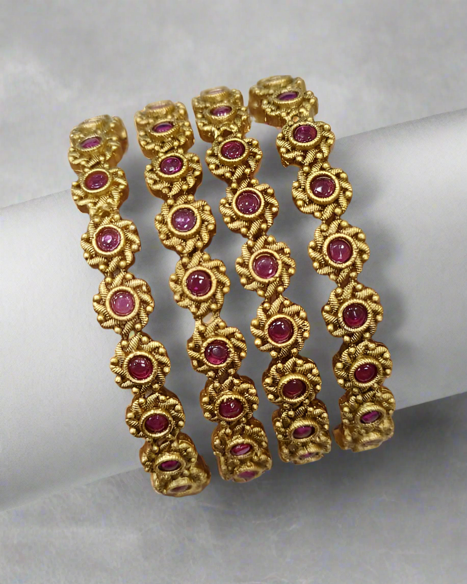 Antique bangles with ruby and emerald stones – festive wear