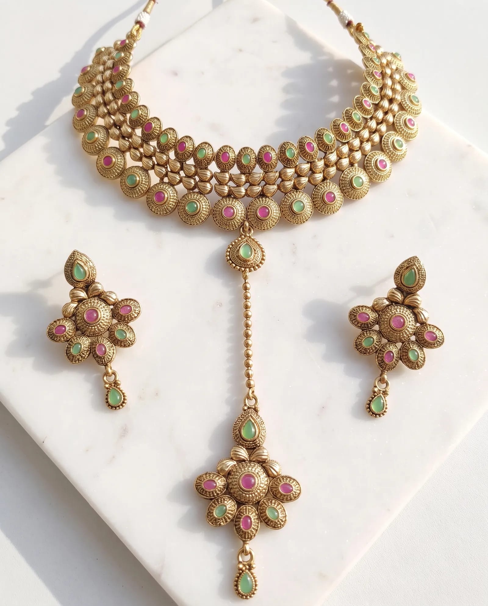 Antique Choker Set laid on white marble