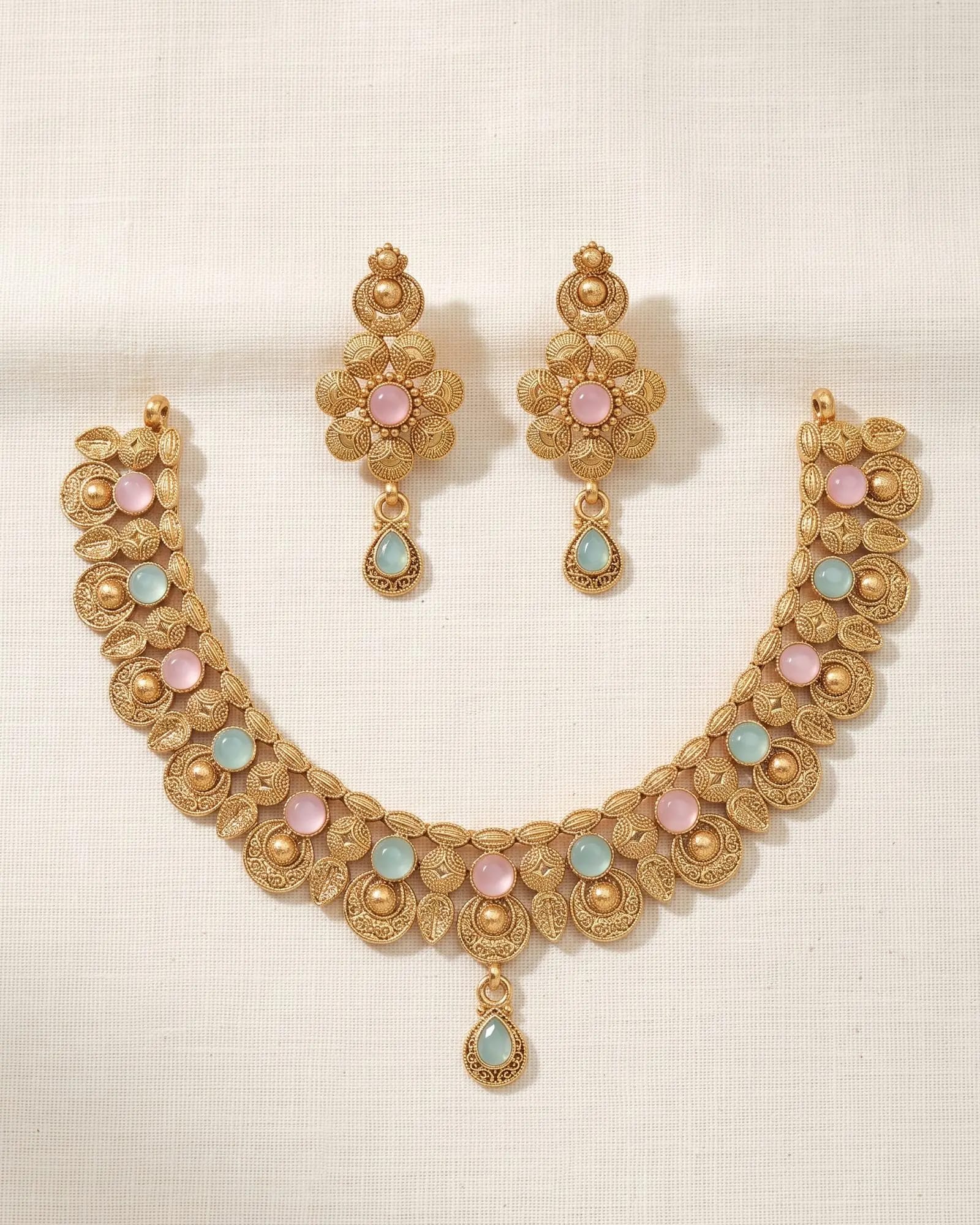 Antique Pink and Mint Stone Choker Set laid on white marble