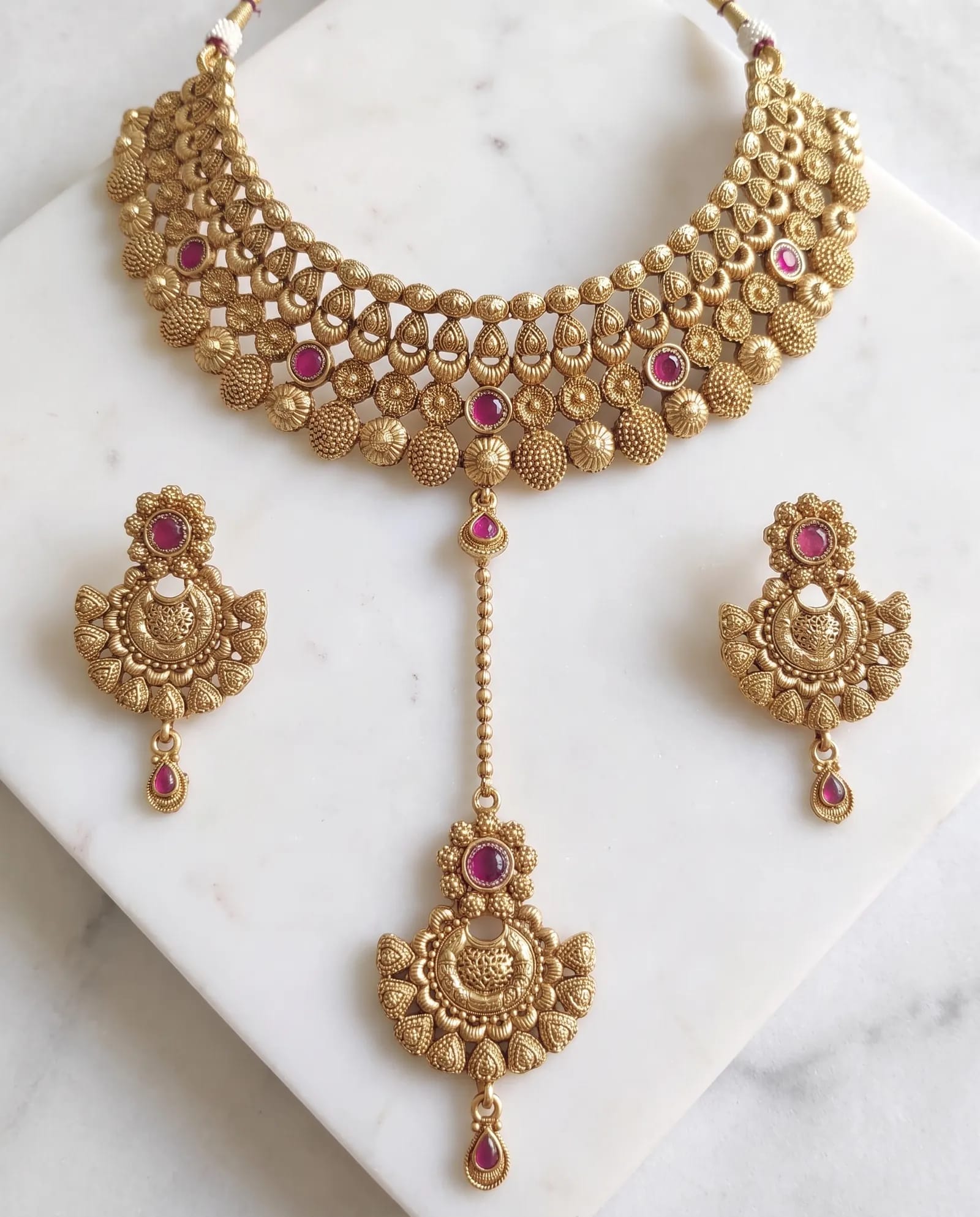 Antique Choker Set laid on white marble