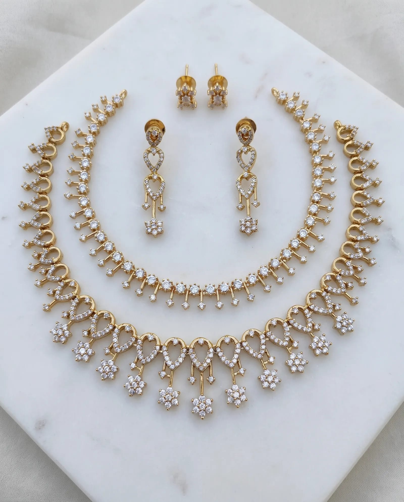 Choker Set combo laid on white marble