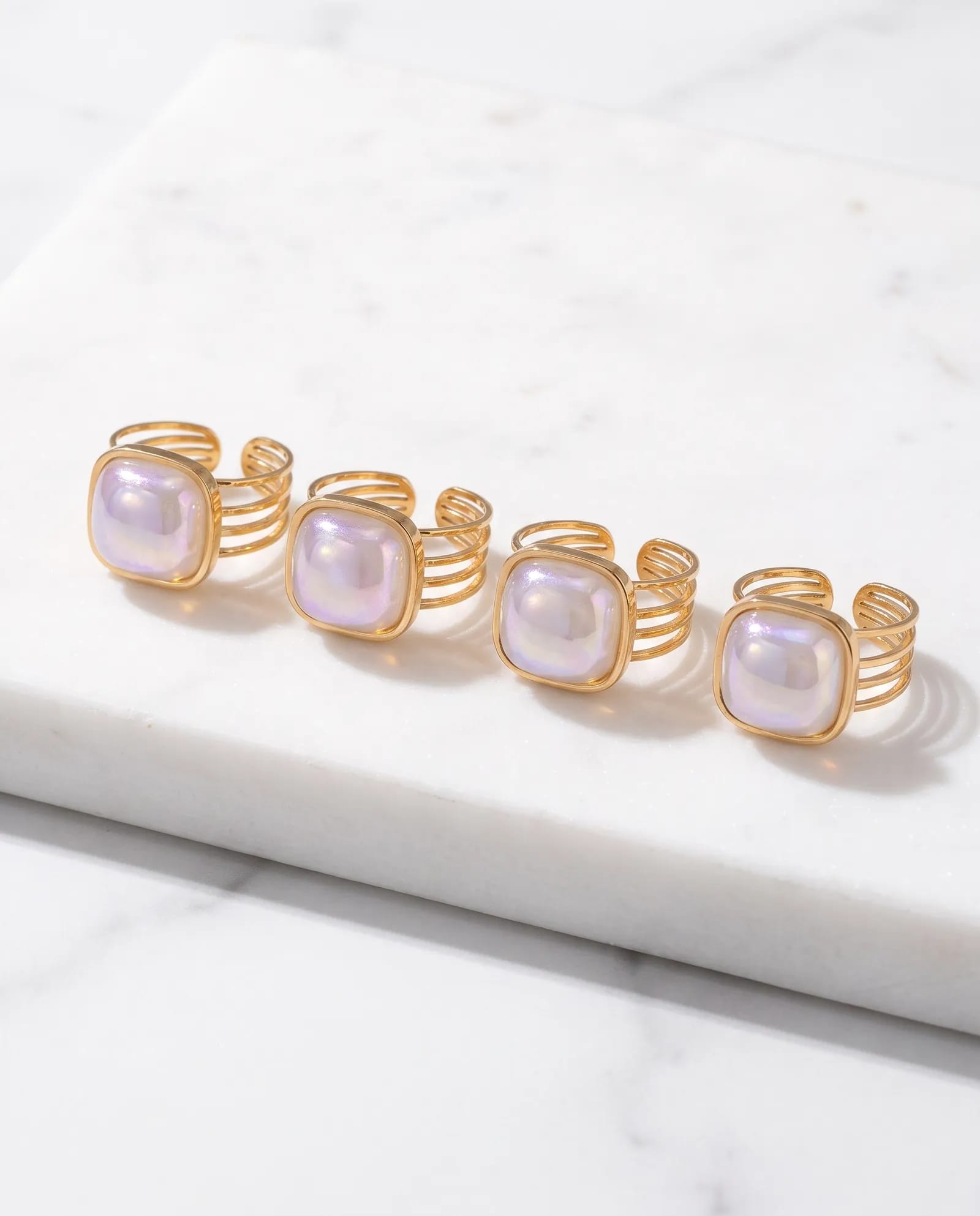 The Lumina Anti Tarnish Ring laid on white marble