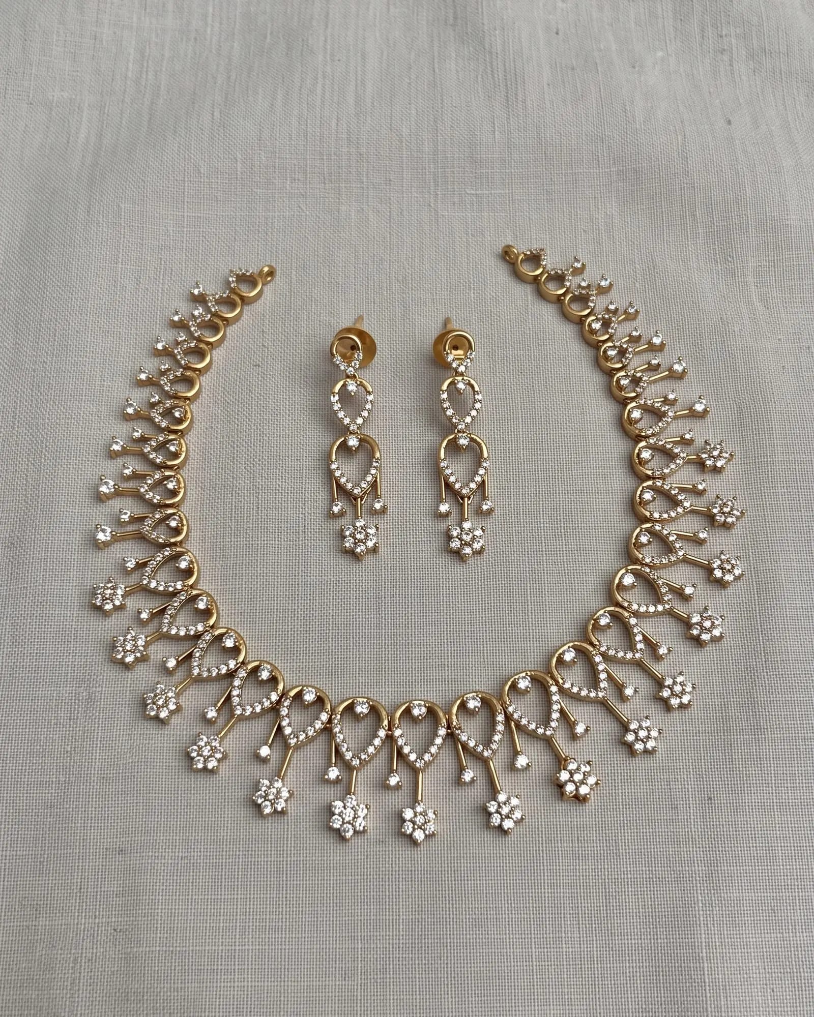 CZ Drop Set laid on white marble
