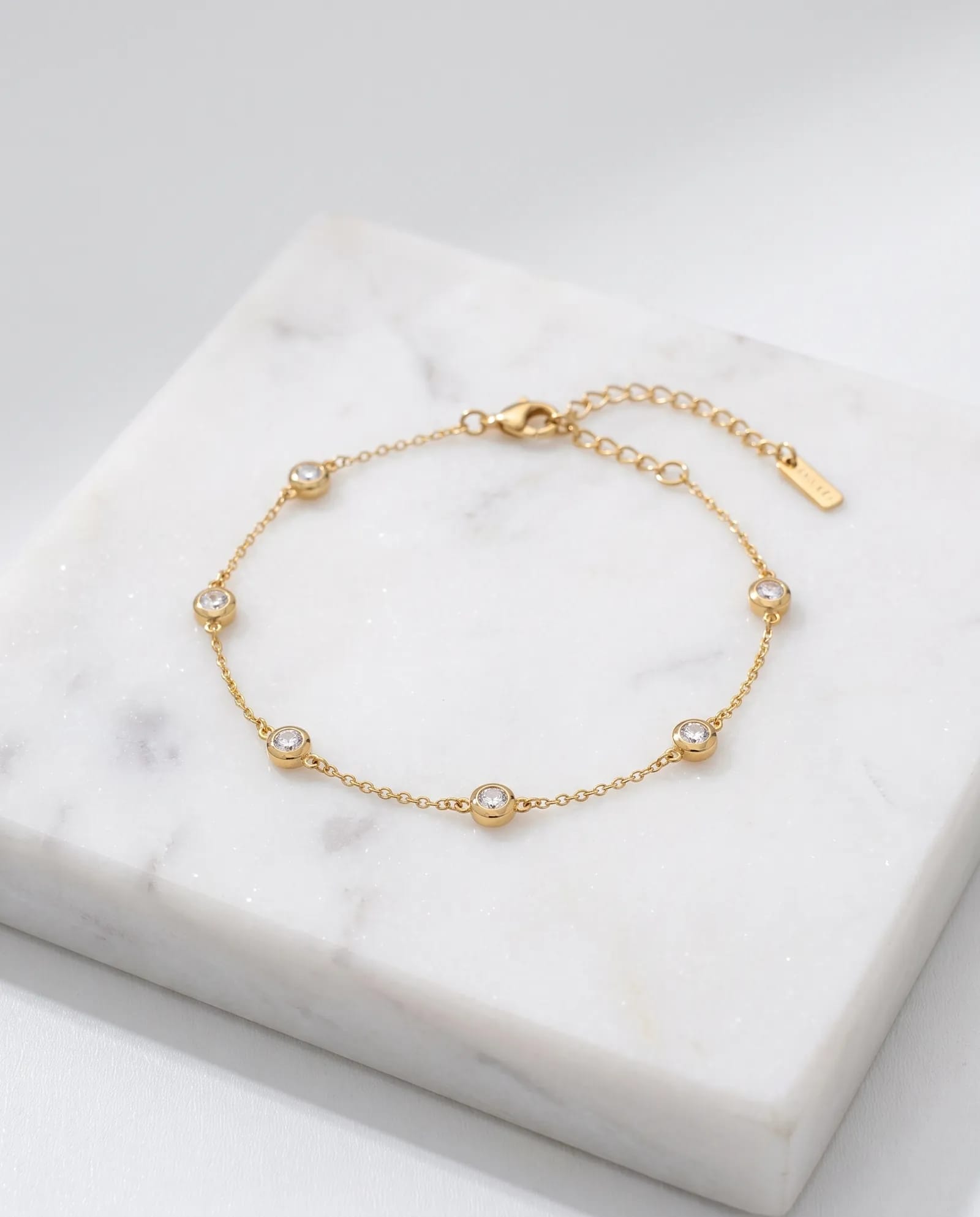 Dot Chain Bracelet Anti Tarnish laid on white marble
