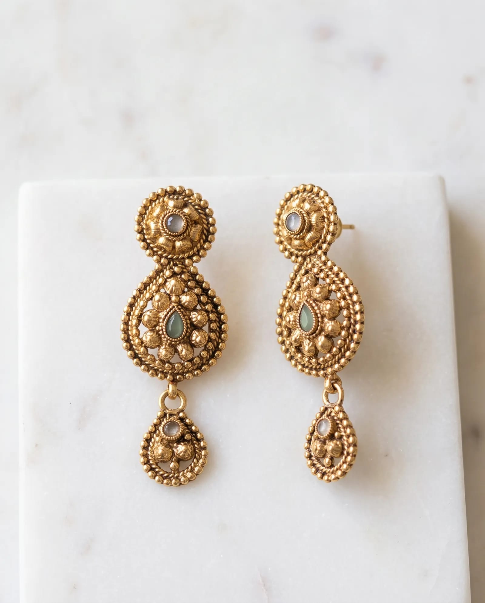 Earring Antique laid on white marble