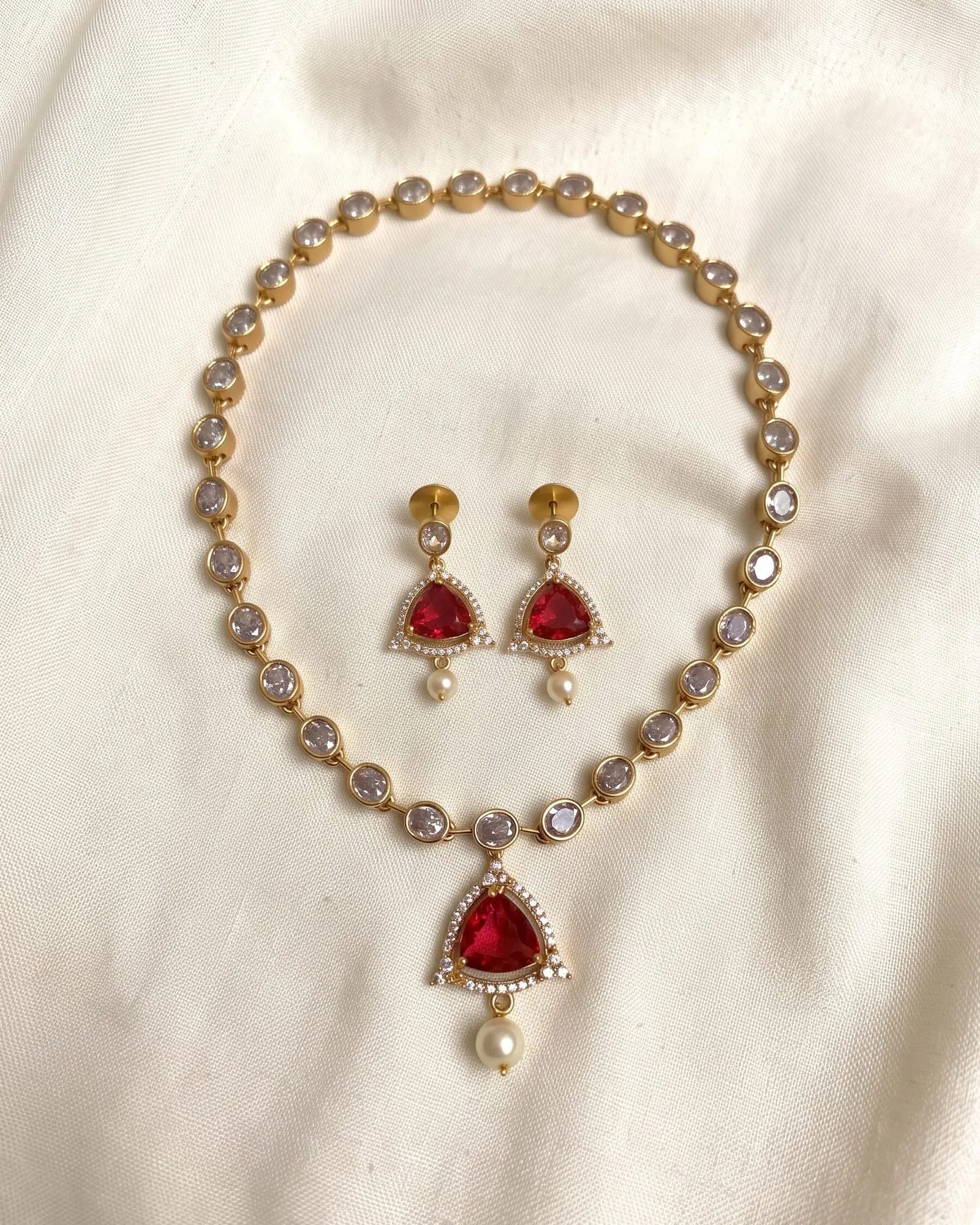Ruby Luxe Set laid on white marble