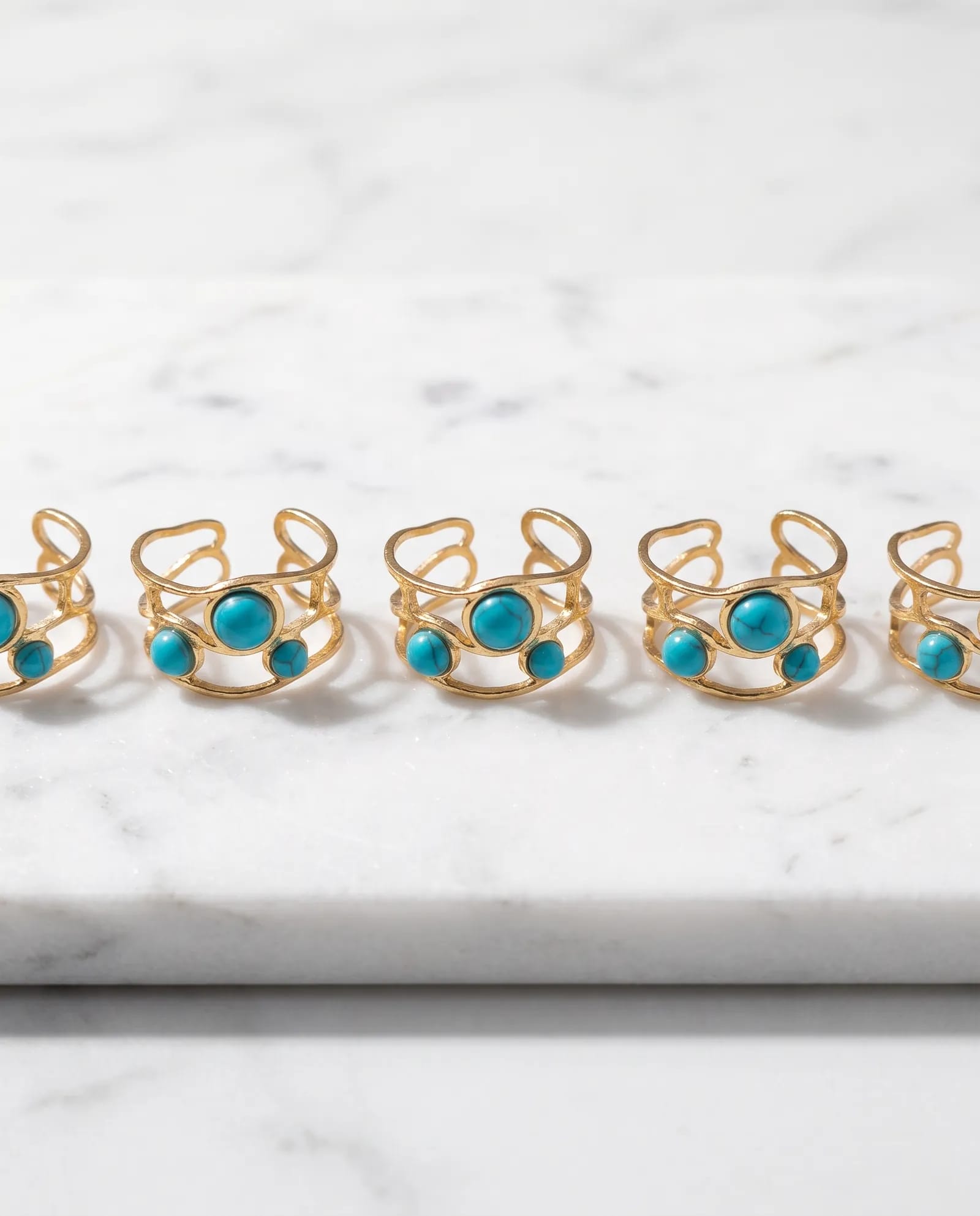Turquoise Glow Anti Tarnish Ring laid on white marble