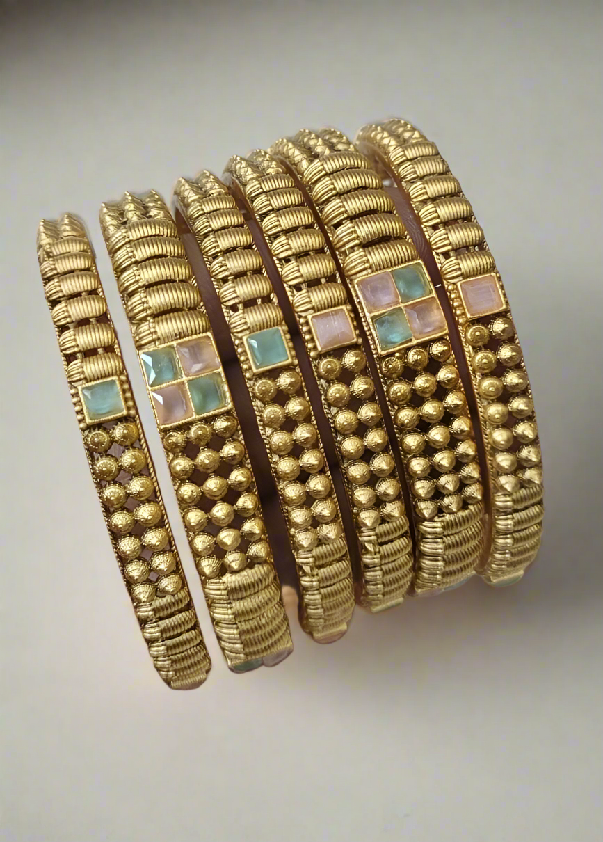 Set of antique bangles with traditional detailing