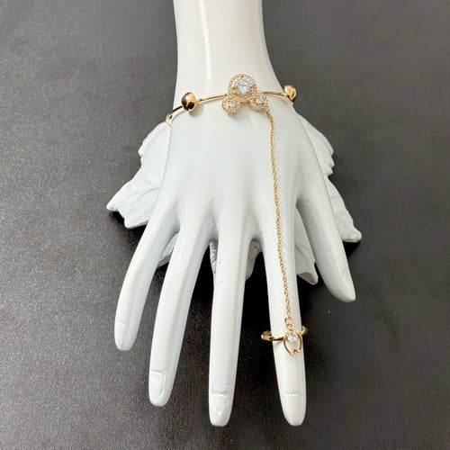 Gold-tone anti-tarnish trefoil hand harness bracelet with matching ring detail